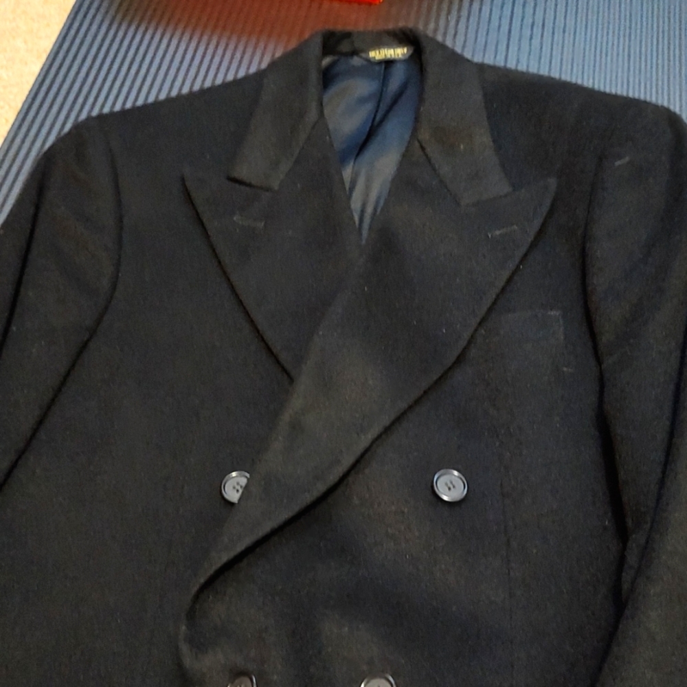 Twice worn, 100 percent black cashmere double breasted dress Jacket.